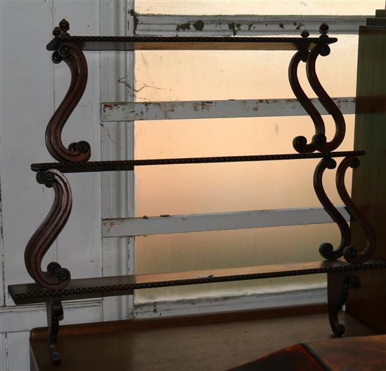Regency style mahogany three shelf wall brackets(-)
